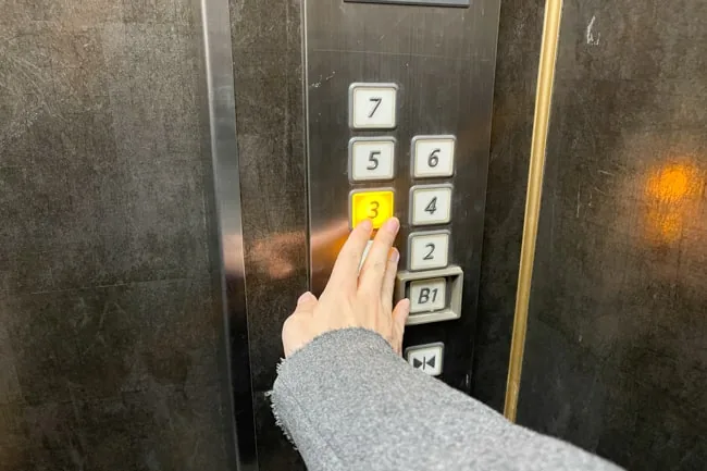 The elevator control for the third floor
